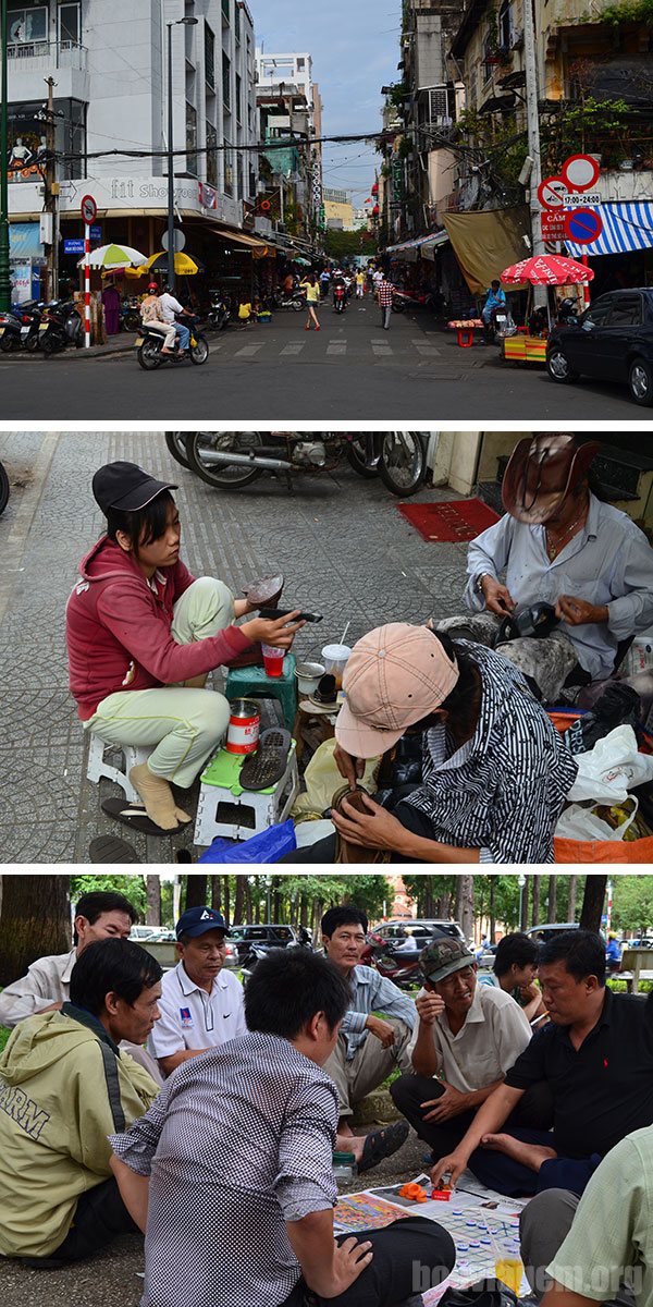 Detalhes de uma rua e algumas pessoas em Saigon