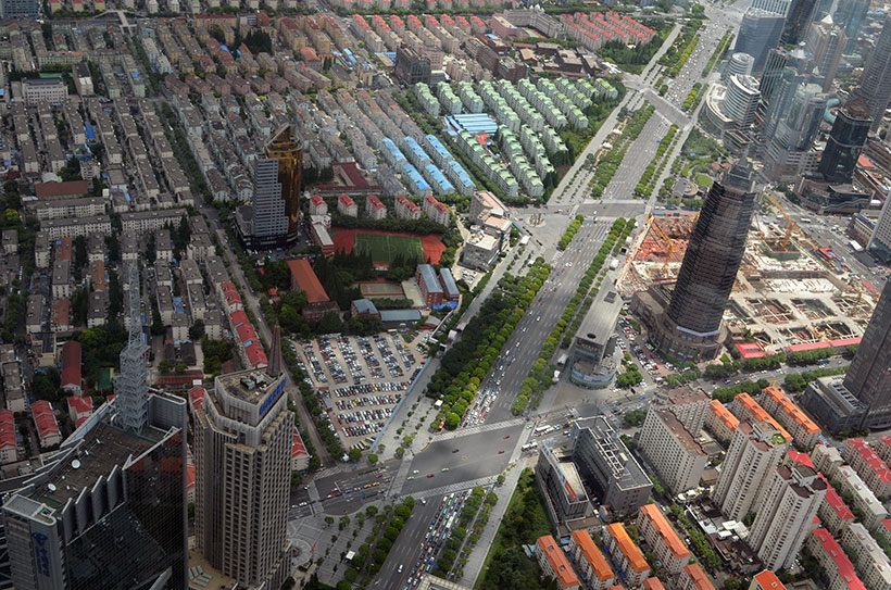 Casas e avenidas que mais parecem maquetes observada da altura do World Financial Center